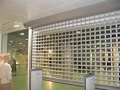 Витринные рольставни на окна DoorHan решетчатые 3000х2800